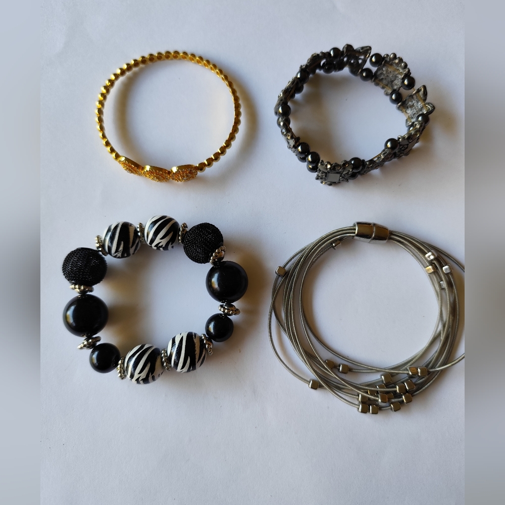 4/$50⭐️Elegant Black and Gold Bracelet Set of 4